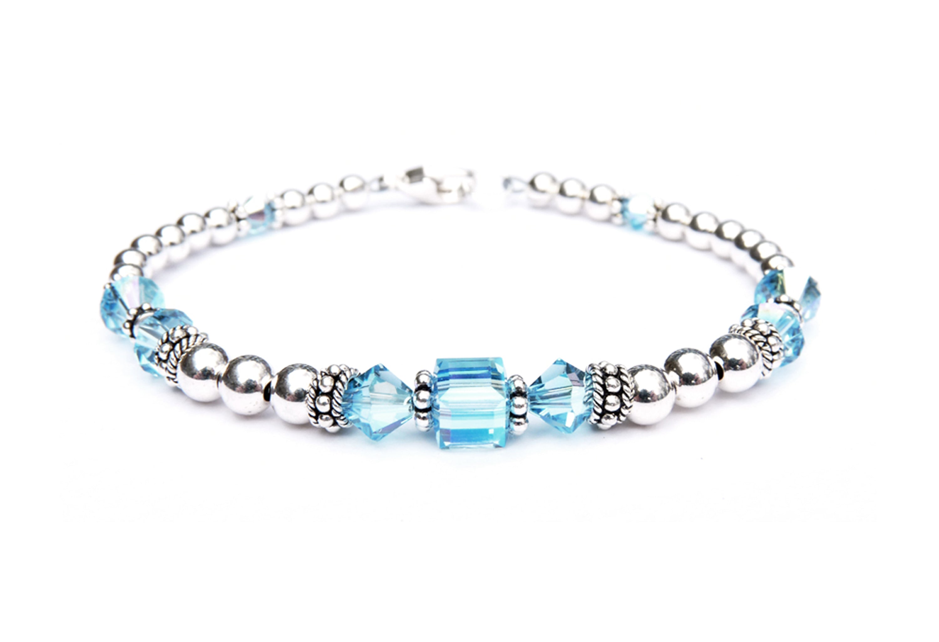 Turquoise and silver beaded outlets bracelet. Handmade Austrian crystals.